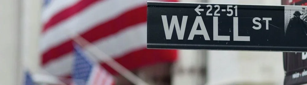 La caída del Dow Jones arrastra a Walmart, que sorprende con resultados positivos
